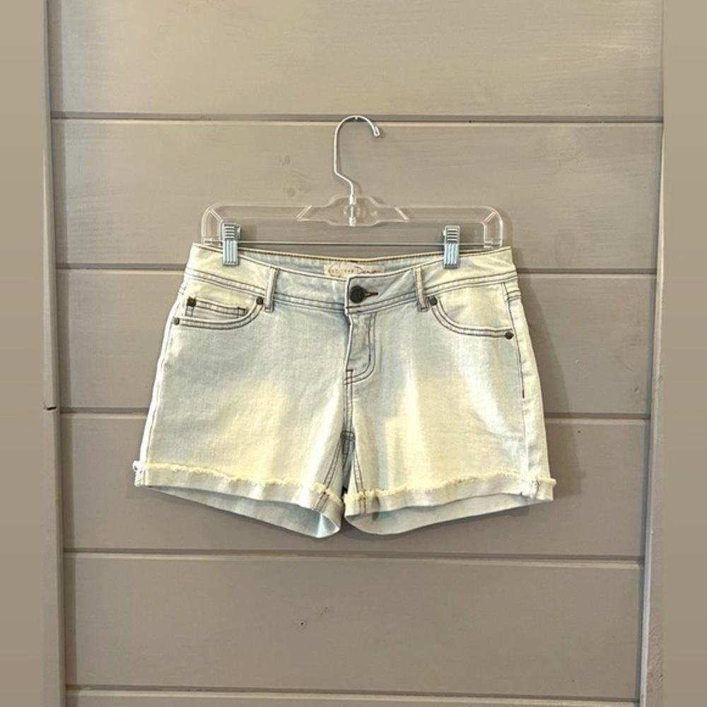 Light wash cut off Jean shorts size 4 detailed distressed stars‎ on back